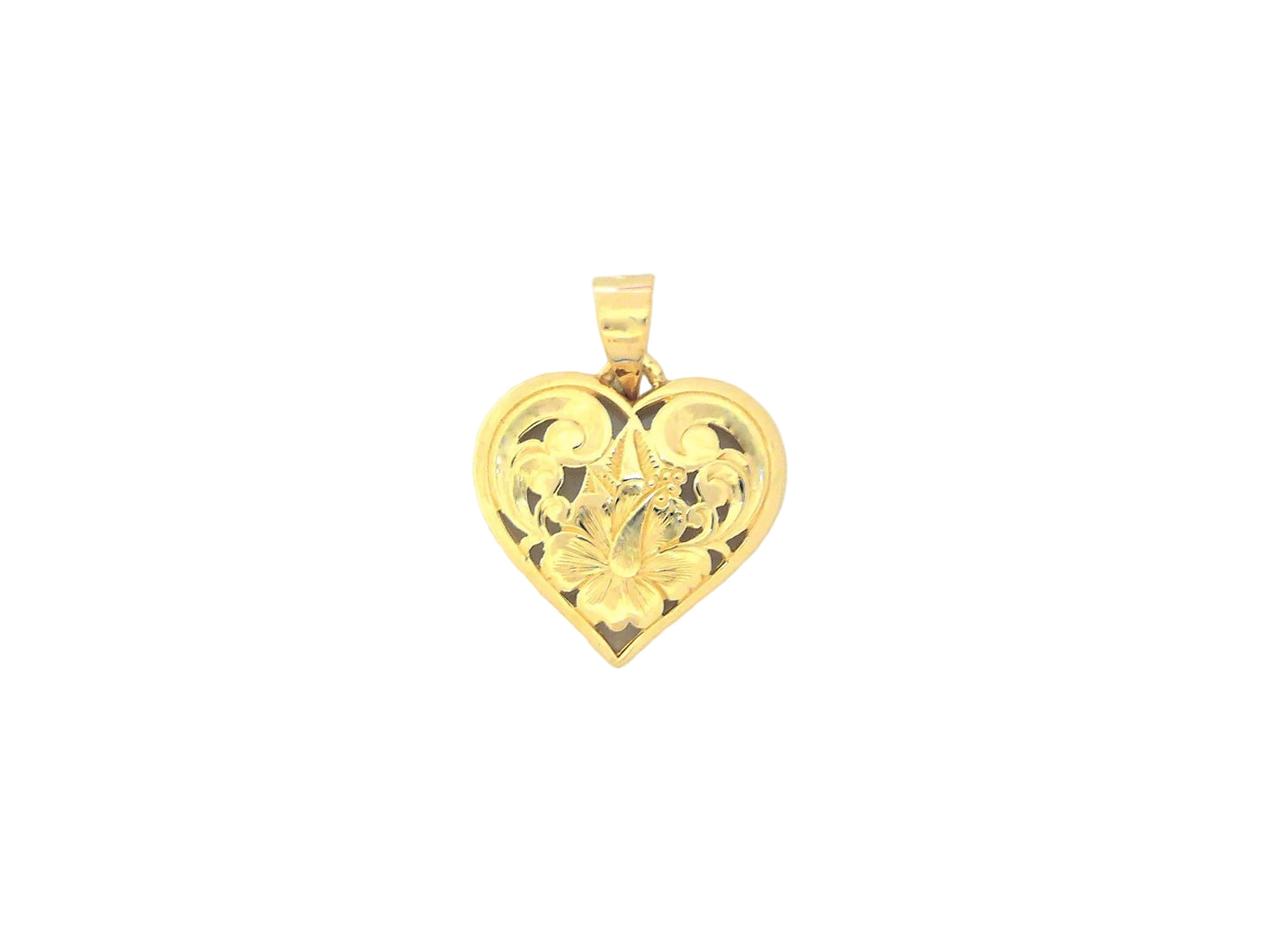 Hawaiian 14K Gold cut-out heart pendant, elegant jewelry piece with open heart design.