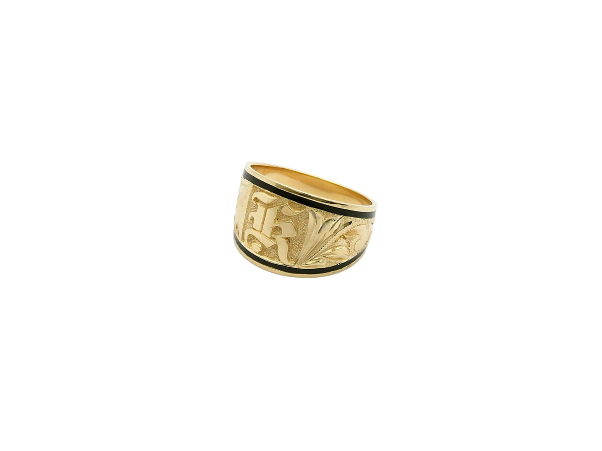 Hawaiian 14K Gold letter with black inlay.