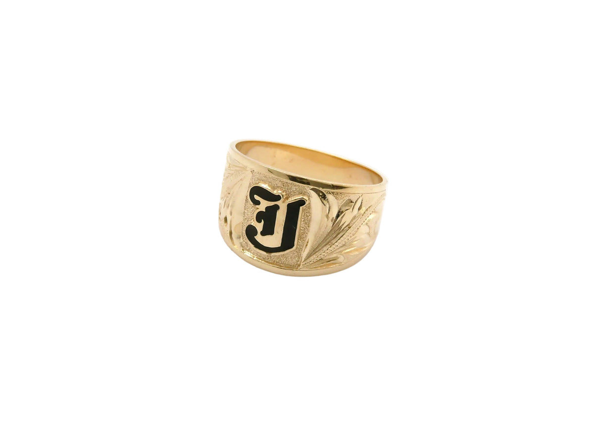 Hawaiian 14K Gold ring with sleek black inlay, polished finish.