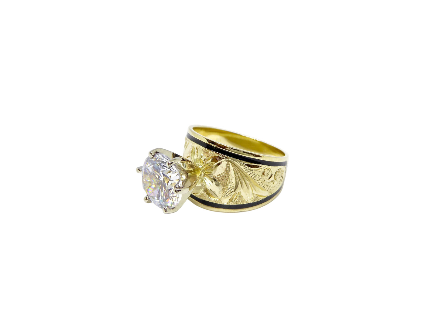 Hawaiian 14K Gold ring with sleek black inlay, featuring a polished design.