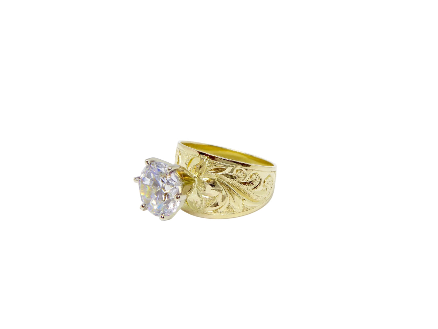 Hawaiian 14K Gold jewelry with tribal design, detailed view.