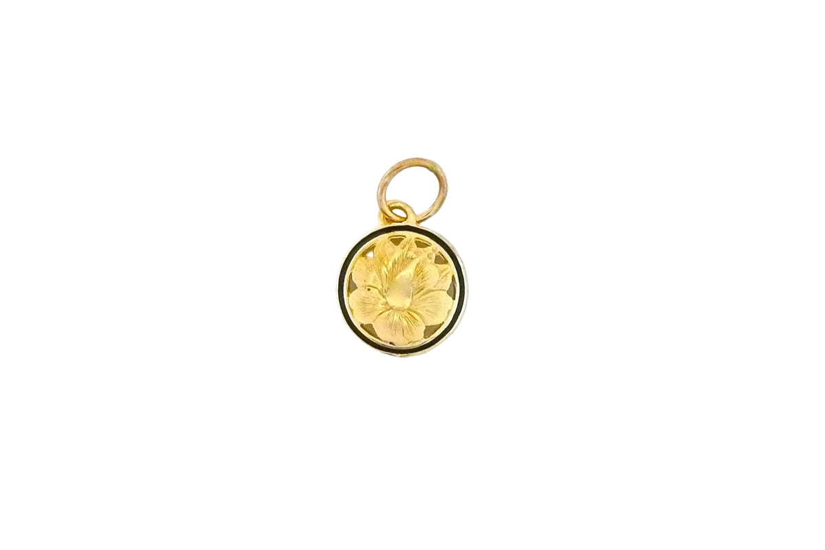 Hawaiian 14K Gold small 14K gold hibiscus cut-out pendant with floral design.