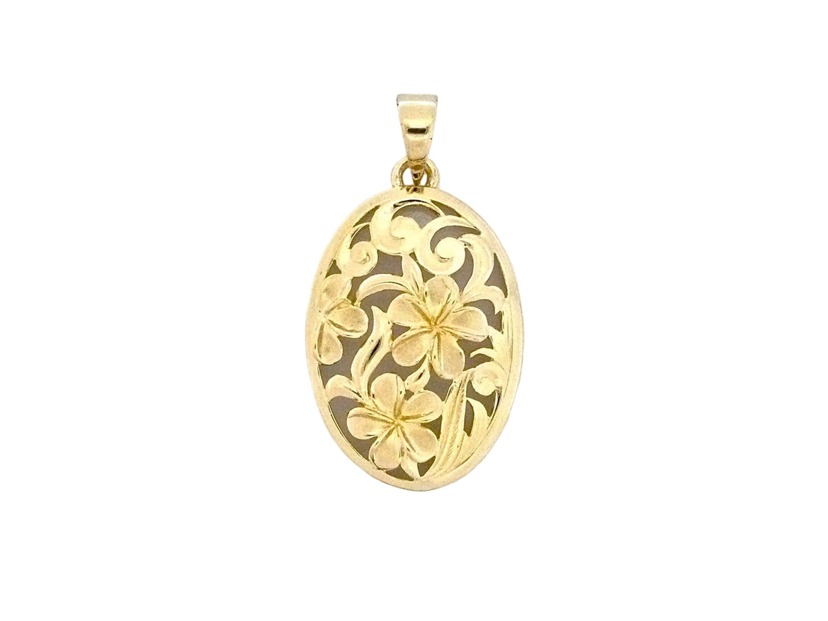 Hawaiian 14K Gold large 14K gold oval Plumeria pendant with intricate floral design.