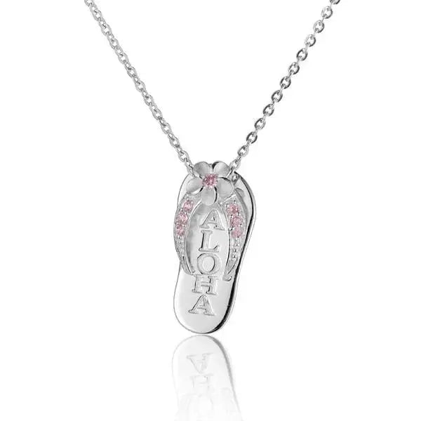 Pink plumeria flower pendant with a 7-carat cubic zirconia, featuring an aloha-themed design, crafted by Ashley's Gift Shop.