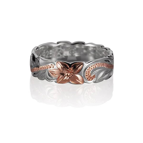 Close-up of Ashley's Gift Shop 6mm Scroll C/O 2T PG ring with intricate scroll design and polished silver finish.