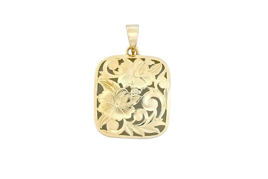 Hawaiian 14K Gold large 14K gold Puanani pendant with intricate floral design, featuring a polished finish and detailed.