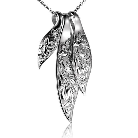 3-in-1 Leave Scroll Pendant with intricate leaf and scroll design, crafted by Ashley's Gift Shop, featuring detailed metalwork.