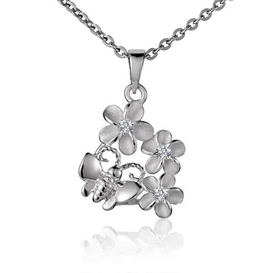 Three sterling silver Plumeria butterfly pendants with detailed floral designs, perfect for jewelry making or accessories.