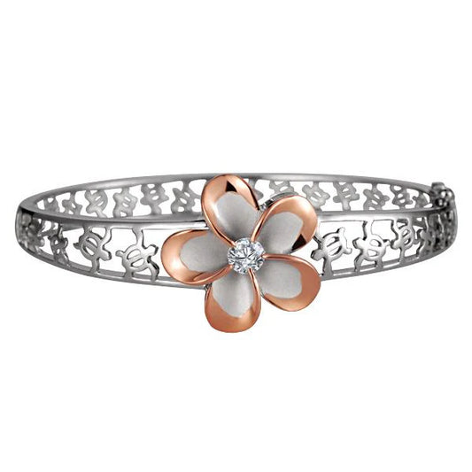 Rhodium-plated 22mm Plumeria bangle bracelet with floral design, showcasing elegant jewelry craftsmanship.