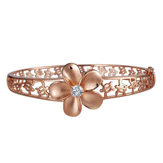 Rhodium pink gold coated 22mm Plumeria bangle bracelet with floral design, showcasing elegant jewelry style.