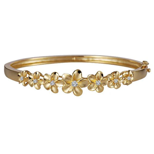 Rhodium and yellow gold coated Plumeria bangle, 8-12mm width, featuring 7 floral designs, jewelry accessory for women