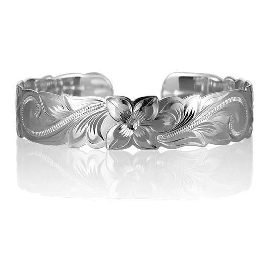 Scroll cuff bangle by Ashley's Gift Shop, 15mm wide, featuring intricate scrolling design in silver-tone metal.