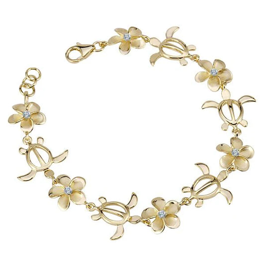 Gold plated Plumeria CZ Honu bracelet with 12mm beads, featuring ocean-inspired turtle charm and floral accents.