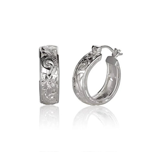Small round scroll silver earring by Ashley's Gift Shop, featuring intricate metalwork and a classic design.