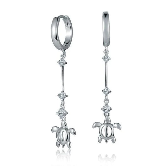 Sterling silver hoop earrings with three cubic zirconia stones and dangling honu turtle charm, sterling silver jewelry.