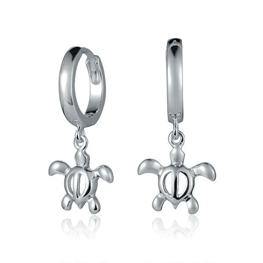 Sterling silver hoop earrings with dangling Honu turtle charms, crafted by Ashley's Gift Shop.