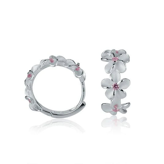 Ashley’s Gift Shop 8mm plumeria pink CZ hook earrings featuring sparkling cubic zirconia accents on gold-tone hooks.