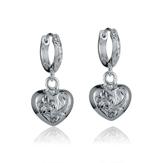 Solid wire earring with heart engraving from Ashley's Gift Shop, featuring a simple, elegant design.