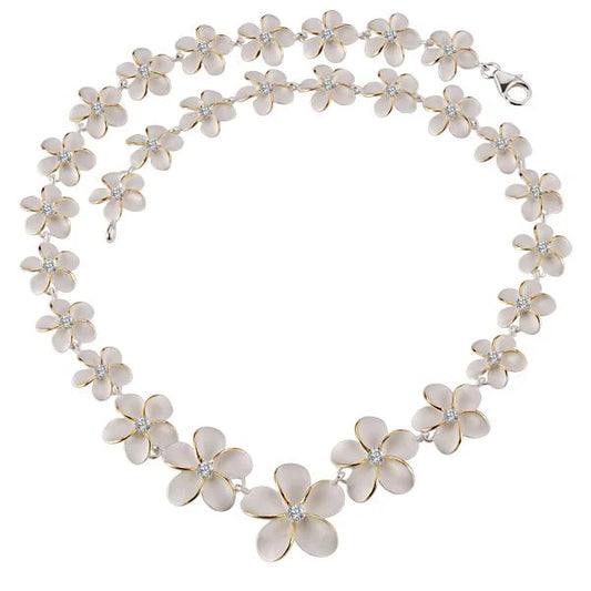 Plumeria CZ necklace with 12-20mm floral pendant, featuring sparkling cubic zirconia stones, styled on a delicate chain.