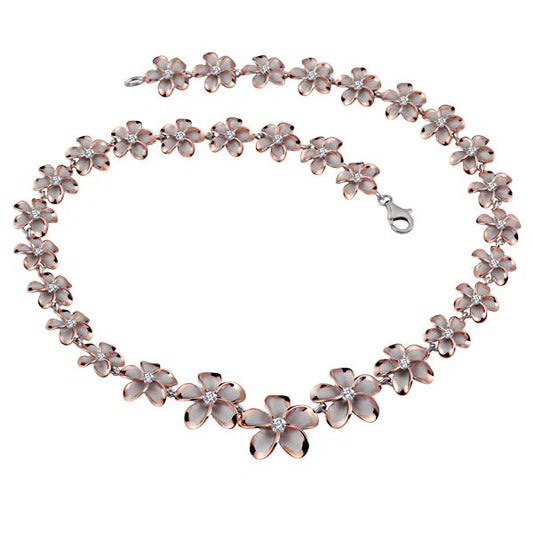 Rhoidum Plumeria 2T PG necklace with 12-20mm purple beads featuring plumeria flower accents, designed by Ashley's Gift Shop