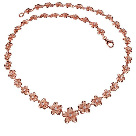 Plumeria PG necklace with 10-15mm beads from Ashley's Gift Shop, featuring a delicate floral pendant and vibrant colors.
