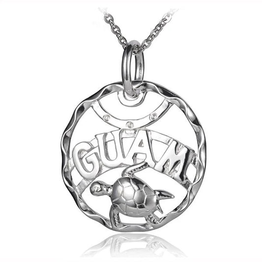 Circle Guam turtle pendant by Ashley's Gift Shop featuring a detailed turtle design on a circular silver pendant.