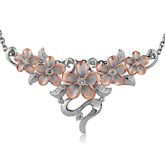 Rhodium-plated Plumeria and 6-leaf CZ slider pendant with detailed floral design, crafted by Ashley's Gift Shop.