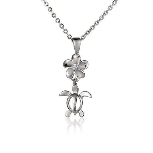 Rhodium-plated Plumeria CZ Honu pendant with 8mm gemstone, featuring a tropical turtle design, jewelry from Ashley's Gift Shop