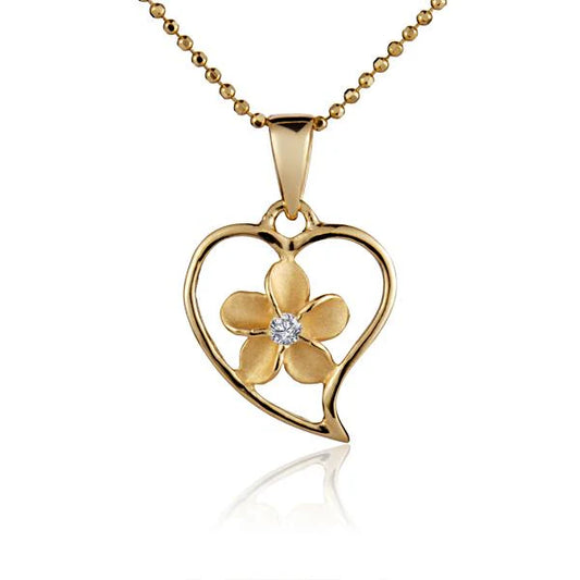 Heart-shaped Plumeria pendant in yellow gold plating with intricate floral design, displayed on a neutral background.