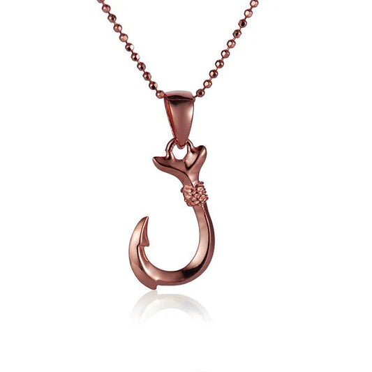 Silver fish hook pendant with PG plating from Ashley's Gift Shop, showcasing a sleek, curved jewelry piece on a plain background.