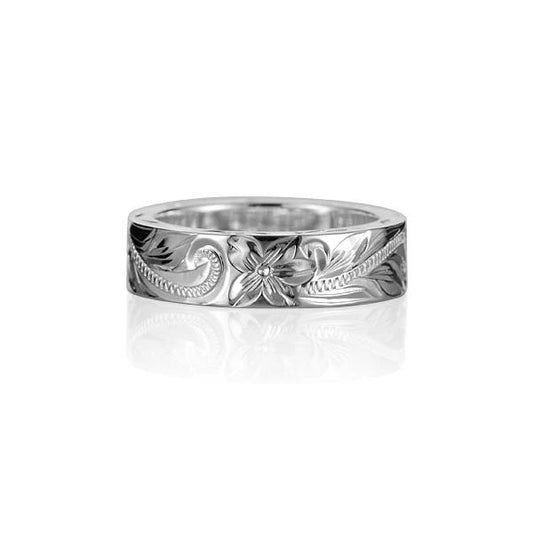 Close-up of Ashley's Gift Shop 6mm and 2.5mm SCR flat side cut ring showing the smooth, polished edges and detailed craftsmanship.