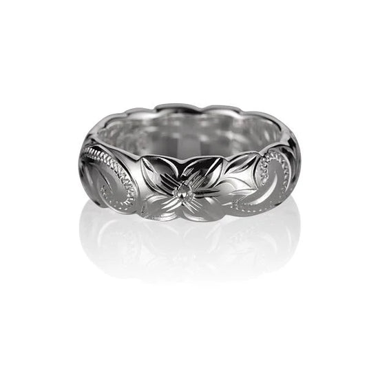 6mm x 1.7mm scroll-style silver ring from Ashley's Gift Shop, featuring intricate engraved detailing on a sleek band.