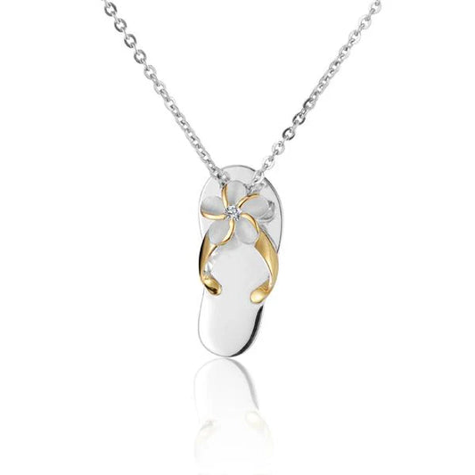 Gold Plumeria CZ slipper pendant with yellow gemstone accents, featuring a delicate floral design and a secure bail for necklace attachment.
