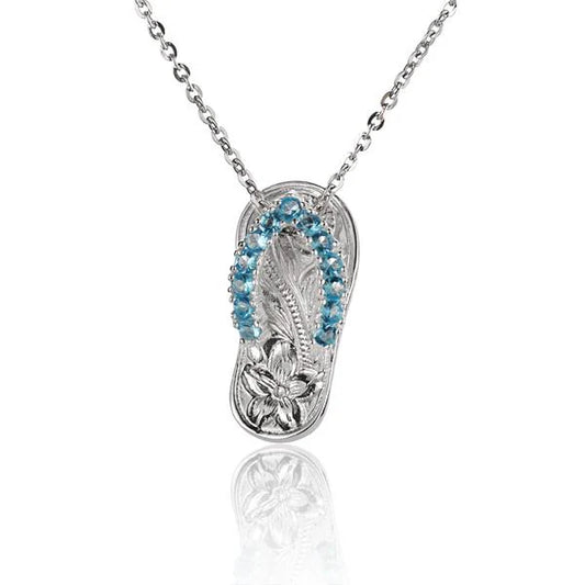 Sterling silver slipper pendant with blue scroll design, 13CZ accent, crafted by Ashley's Gift Shop.