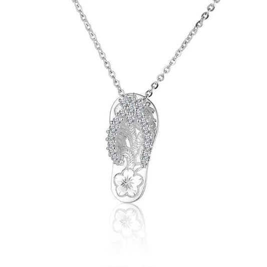 18CZ Scroll Slipper Pendant by Ashley's Gift Shop featuring a silver-toned slipper-shaped pendant with intricate scroll detailing.