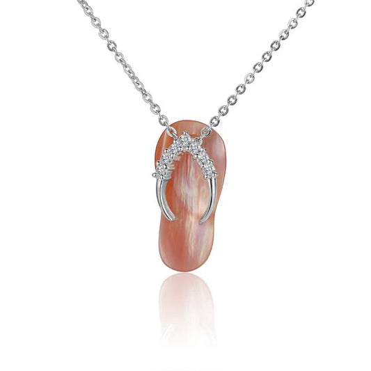 Plumeria 7CZ Shell Slipper Pendant featuring cubic zirconia stones and a delicate shell design, perfect for jewelry collection.