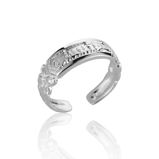 Silver Kuuipo scroll toe ring featuring intricate design, perfect for stylish beach or casual wear.