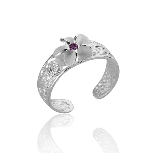 Ashley’s Gift Shop plumeria scroll CZ toe ring with 8mm band, featuring intricate floral and scroll design in silver-tone metal.