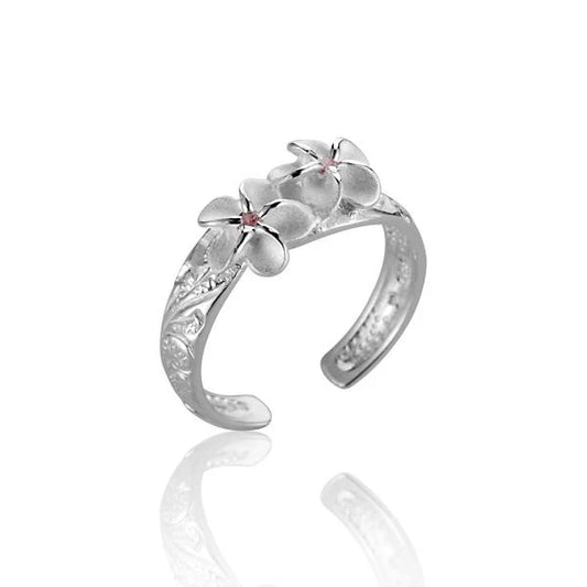 Two plumeria scroll CZ toe ring featuring sparkling cubic zirconia accents, crafted by Ashley's Gift Shop.