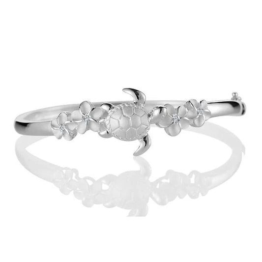 Sterling silver B 4 Plumeria with 1 Turtle open bangle bracelet, featuring floral and turtle details in a delicate design.
