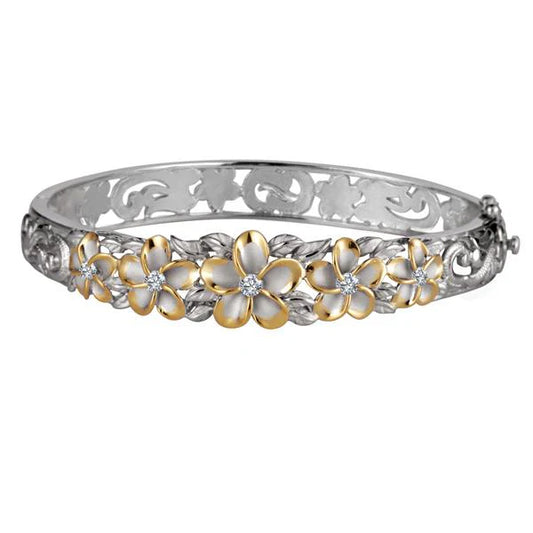 Sterling silver 10-15mm 5-plumeria rhodium bangle featuring intricate floral design, crafted by Ashley's Gift Shop.