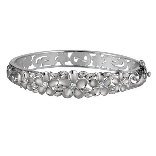 Sterling silver Plumeria bangle featuring 10-15mm rhodium-plated flowers, crafted with 925 sterling silver for elegant jewelry.