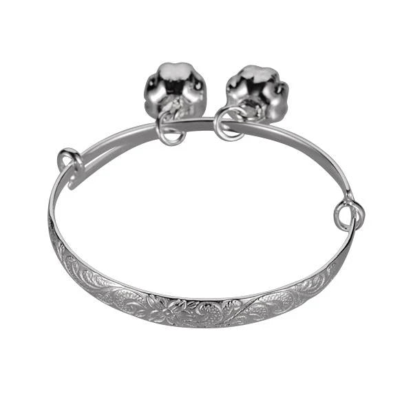 Hawaiian 925 Sterling Silver baby scroll bangle with a small bell, featuring intricate scroll design.