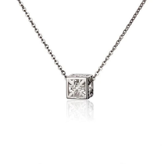 Small cubic c/o quilt pendant by Ashley's Gift Shop featuring a detailed, textured fabric design on a silver-tone setting.