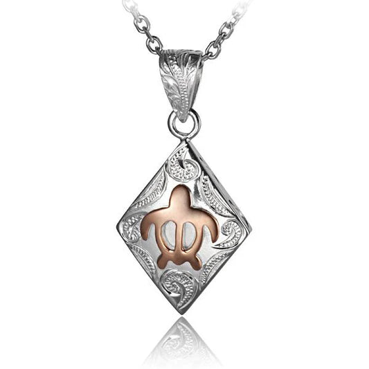 Diamond Scroll Honu pendant featuring a turtle design with sparkling diamonds, crafted by Ashley's Gift Shop.