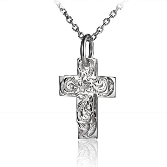 Double scroll cross pendant from Ashley's Gift Shop, featuring intricate metalwork and a polished finish.