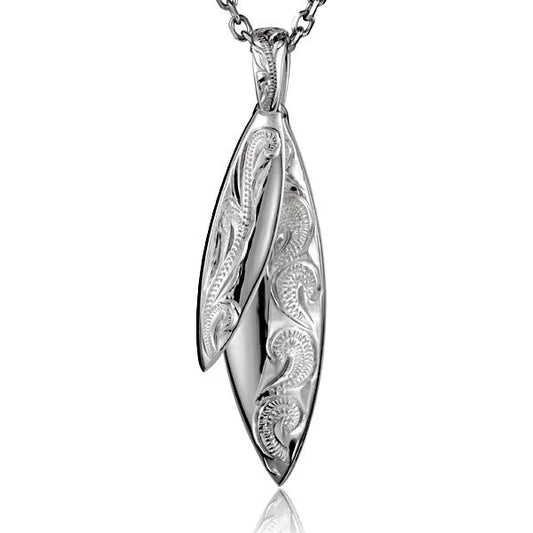 Double surfboard pendant necklace featuring two sleek surfboards, crafted by Ashley's Gift Shop, displayed against a plain background.