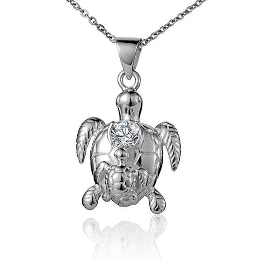 Double turtle CZ pendant featuring sparkling cubic zirconia stones, crafted by Ashley's Gift Shop.