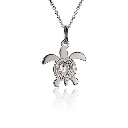 Engraved Honu pendant from Ashley's Gift Shop featuring a detailed turtle design on a silver chain necklace.
