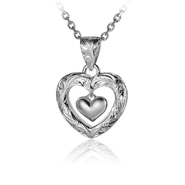 Hawaiian 925 Sterling Silver necklace with an outline heart pendant and a dangling heart charm, featuring engraved detailing.
